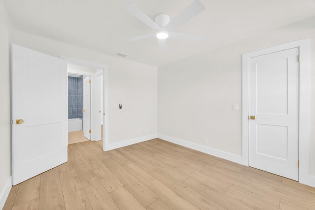 400 Riverside Dr, Palm Beach Gardens, FL 33410 - empty room with light wood-style flooring and a ceiling fan