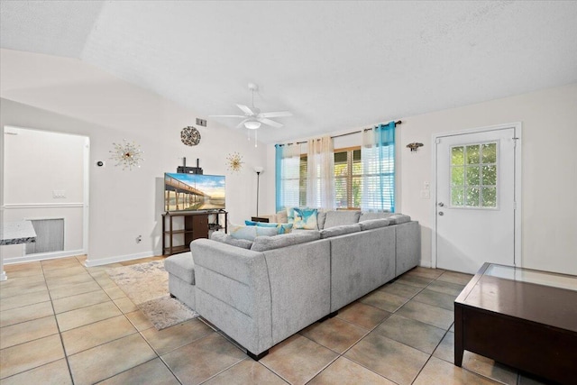6015 Raintree Trl, Fort Pierce, FL 34982 - tiled living area featuring a ceiling fan and vaulted ceiling
