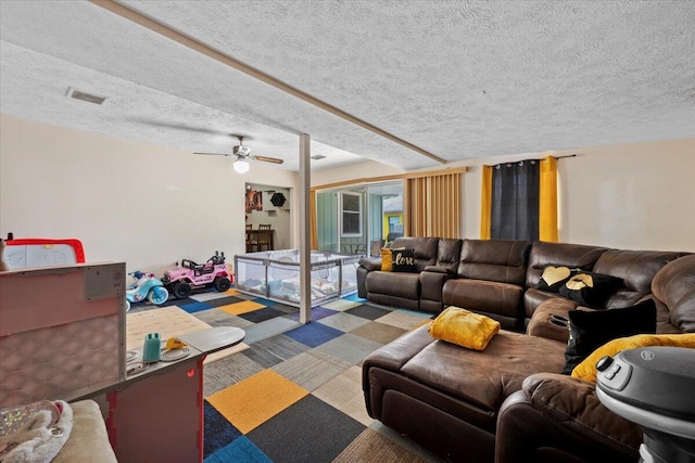 6015 Raintree Trl, Fort Pierce, FL 34982 - carpeted living room featuring a textured ceiling and ceiling fan