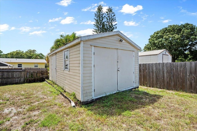 6015 Raintree Trl, Fort Pierce, FL 34982 - view of shed with a fenced backyard