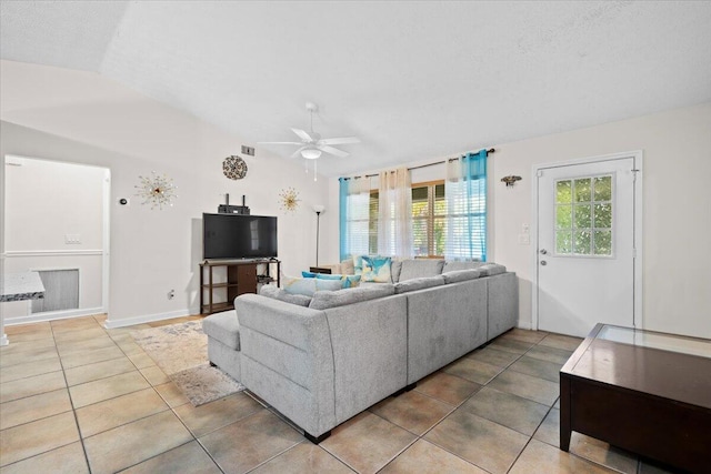 6015 Raintree Trl, Fort Pierce, FL 34982 - living area featuring ceiling fan, tile patterned flooring, and vaulted ceiling