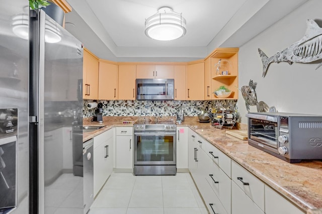4101 N Ocean Blvd Unit 908, Boca Raton, FL 33431 - kitchen featuring appliances with stainless steel finishes, light tile patterned floors, backsplash, open shelves, and light stone countertops