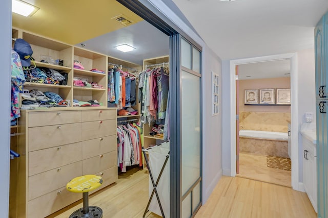 4101 N Ocean Blvd Unit 908, Boca Raton, FL 33431 - spacious closet featuring light wood-style floors