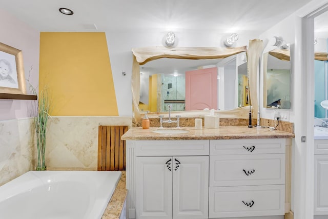 4101 N Ocean Blvd Unit 908, Boca Raton, FL 33431 - full bathroom with radiator heating unit, vanity, and a garden tub