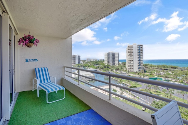 4101 N Ocean Blvd Unit 908, Boca Raton, FL 33431 - balcony with a city view and a water view