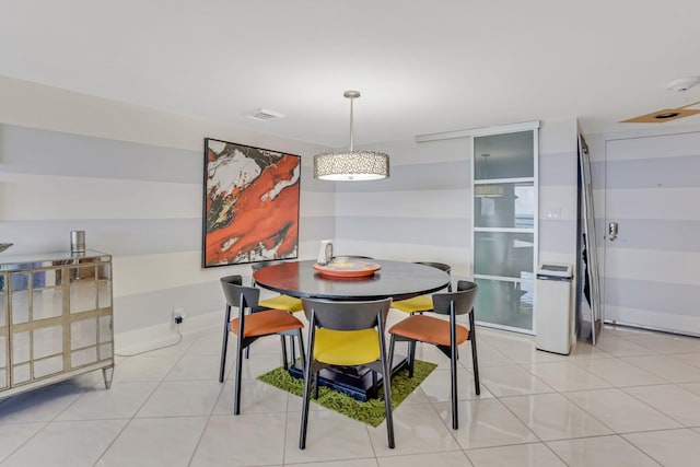 4101 N Ocean Blvd Unit 908, Boca Raton, FL 33431 - dining room featuring light tile patterned floors and baseboards