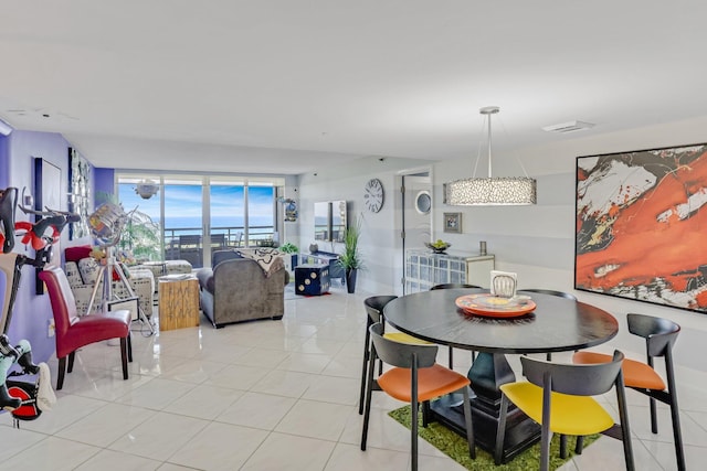 4101 N Ocean Blvd Unit 908, Boca Raton, FL 33431 - dining room featuring light tile patterned flooring