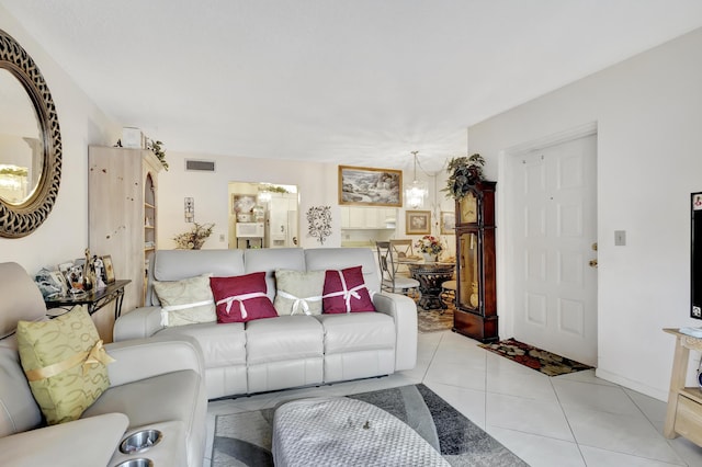 1102 Green Pine Blvd Unit A1, West Palm Beach, FL 33409 - living room with light tile patterned floors