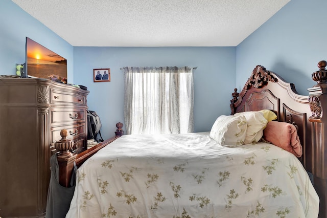 1102 Green Pine Blvd Unit A1, West Palm Beach, FL 33409 - bedroom with a textured ceiling