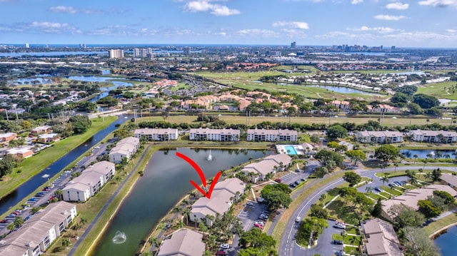 1102 Green Pine Blvd Unit A1, West Palm Beach, FL 33409 - aerial overview of property's location with a nearby body of water and nearby suburban area