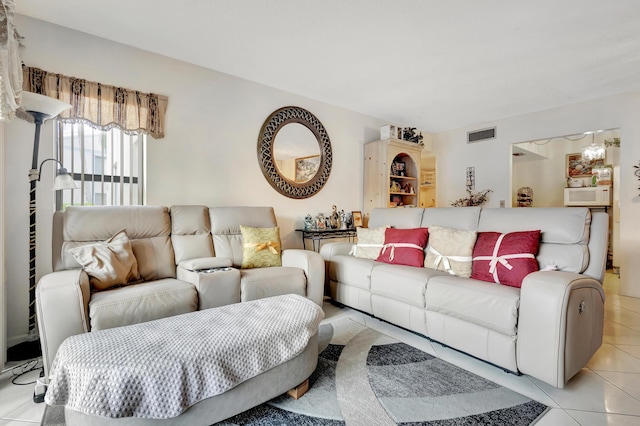 1102 Green Pine Blvd Unit A1, West Palm Beach, FL 33409 - living room featuring light tile patterned floors