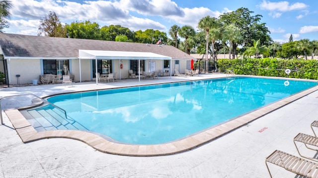 1102 Green Pine Blvd Unit A1, West Palm Beach, FL 33409 - community pool with a patio area