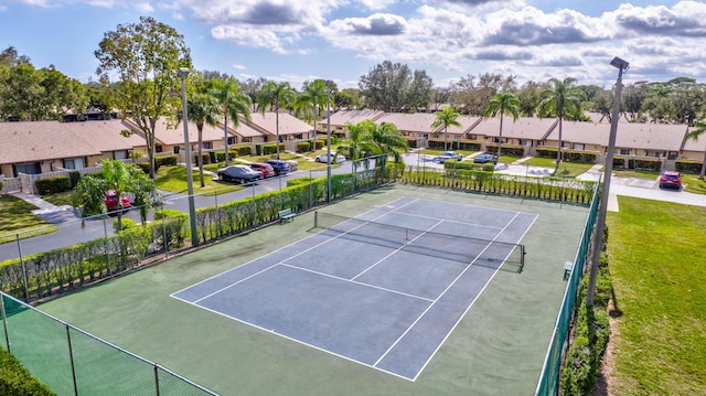 1102 Green Pine Blvd Unit A1, West Palm Beach, FL 33409 - view of tennis court with a residential view