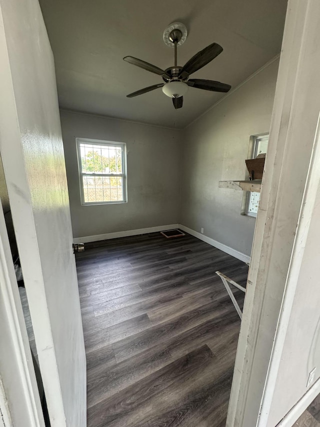 1801 N 25th St, Fort Pierce, FL 34947 - empty room featuring dark wood-style flooring and ceiling fan