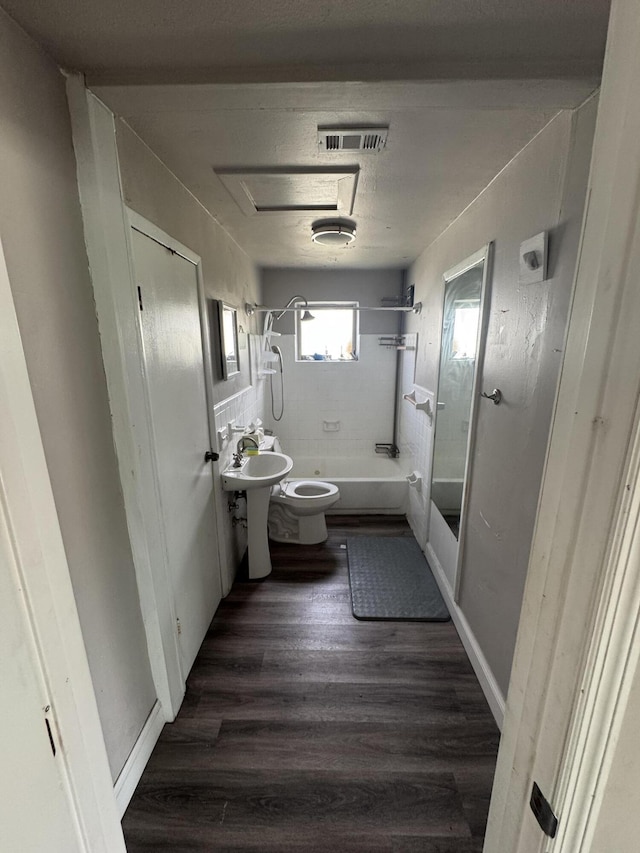 1801 N 25th St, Fort Pierce, FL 34947 - full bathroom with  shower combination and wood finished floors