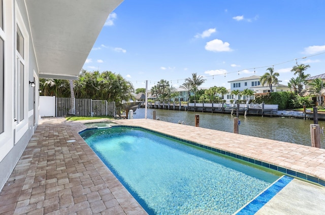 1555 SE 7th St, Deerfield Beach, FL 33441 - view of pool with a water view, a pool with connected hot tub, and a boat dock