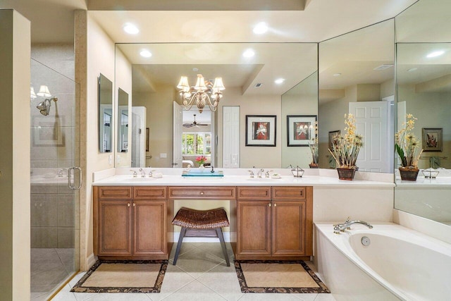 112 Palm Bay Dr Unit A, Palm Beach Gardens, FL 33418 - full bathroom with a chandelier, a shower stall, double vanity, a garden tub, and recessed lighting