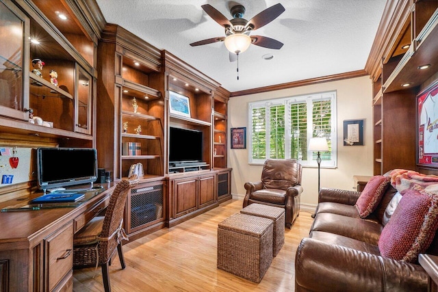 112 Palm Bay Dr Unit A, Palm Beach Gardens, FL 33418 - living area with ornamental molding, light wood finished floors, a ceiling fan, a desk, and a textured ceiling