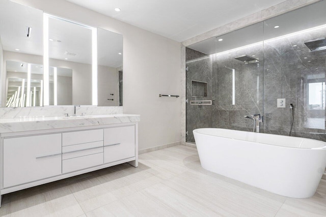 200 SE Mizner Blvd Unit 514, Boca Raton, FL 33432 - full bathroom featuring a freestanding tub, vanity, and a shower stall
