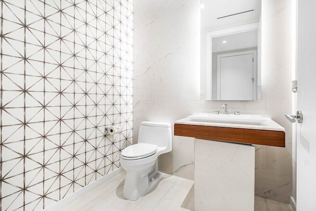 200 SE Mizner Blvd Unit 514, Boca Raton, FL 33432 - bathroom with a sink and tile walls