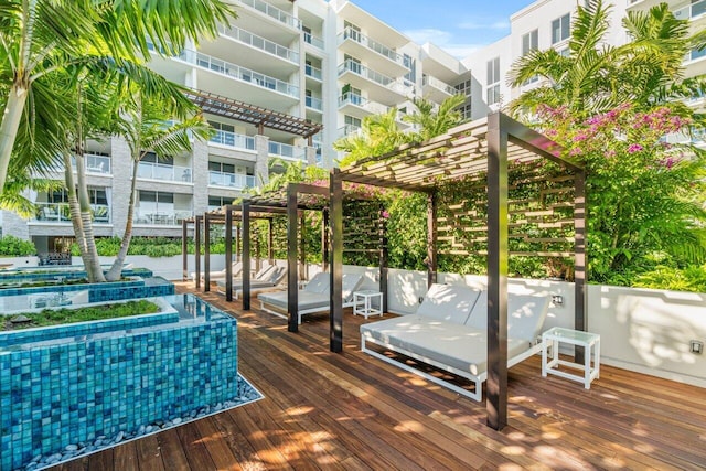 200 SE Mizner Blvd Unit 514, Boca Raton, FL 33432 - deck featuring a pergola and a swimming pool