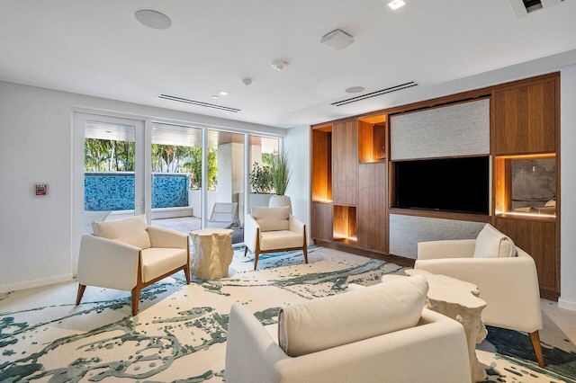 200 SE Mizner Blvd Unit 514, Boca Raton, FL 33432 - living area with baseboards and light colored carpet