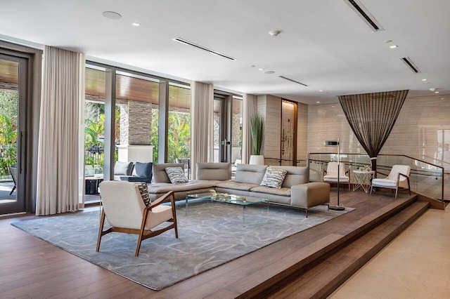 200 SE Mizner Blvd Unit 514, Boca Raton, FL 33432 - living area featuring expansive windows, wood finished floors, and recessed lighting