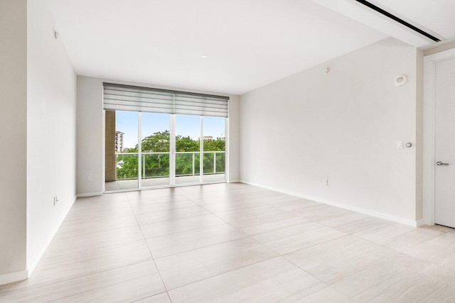 200 SE Mizner Blvd Unit 514, Boca Raton, FL 33432 - unfurnished room with light tile patterned flooring and baseboards
