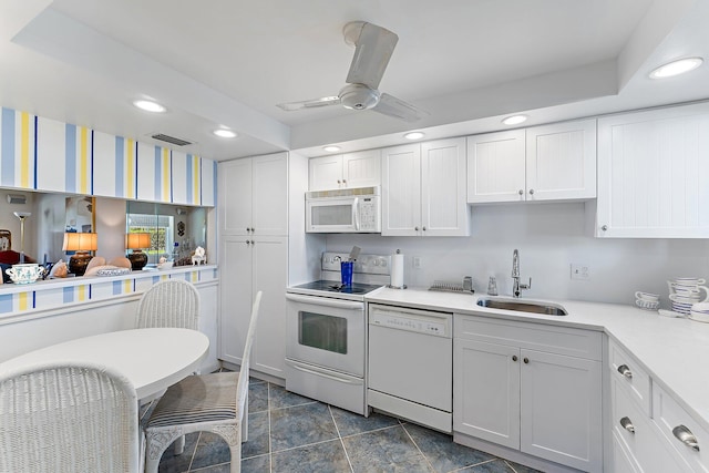3186 Via Poinciana Unit 111, Lake Worth, FL 33467 - kitchen featuring white appliances, recessed lighting, white cabinetry, ceiling fan, and light countertops