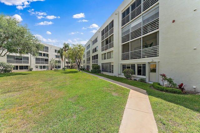 3186 Via Poinciana Unit 111, Lake Worth, FL 33467 - view of apartment building / complex