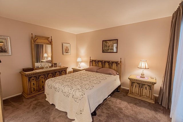 309 NE Jonquil St, Port Saint Lucie, FL 34983 - bedroom with carpet floors and baseboards