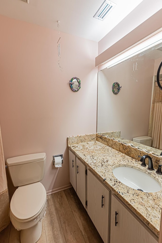 309 NE Jonquil St, Port Saint Lucie, FL 34983 - full bath with wood finished floors and vanity