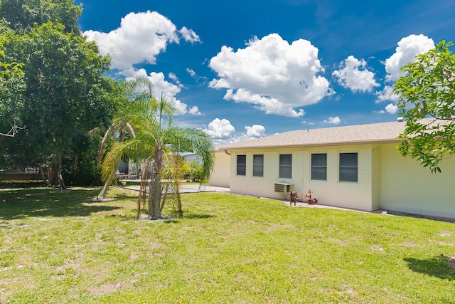 309 NE Jonquil St, Port Saint Lucie, FL 34983 - view of grassy yard