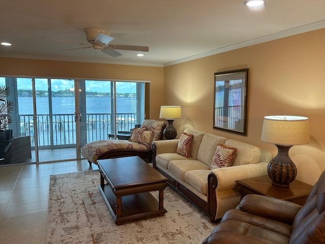 1868 SW Palm City Rd Unit 304, Stuart, FL 34994 - living area featuring a ceiling fan, recessed lighting, a water view, and ornamental molding