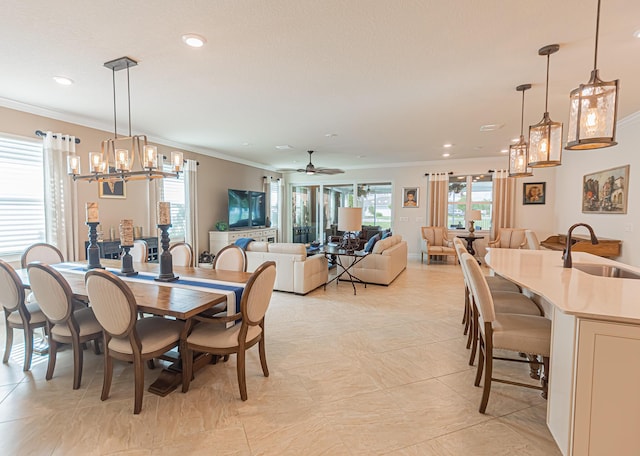 12736 SW Cattleya Ln, Port Saint Lucie, FL 34987 - dining space with ornamental molding, a chandelier, recessed lighting, ceiling fan, and light tile patterned floors