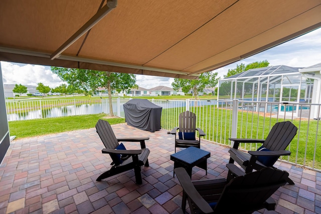 12736 SW Cattleya Ln, Port Saint Lucie, FL 34987 - view of patio / terrace with a water view, a grill, and a lanai