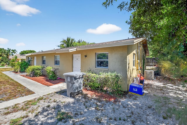7891 Loomis St Unit 7891/7893, Lake Worth, FL 33462 - bungalow-style home with stucco siding