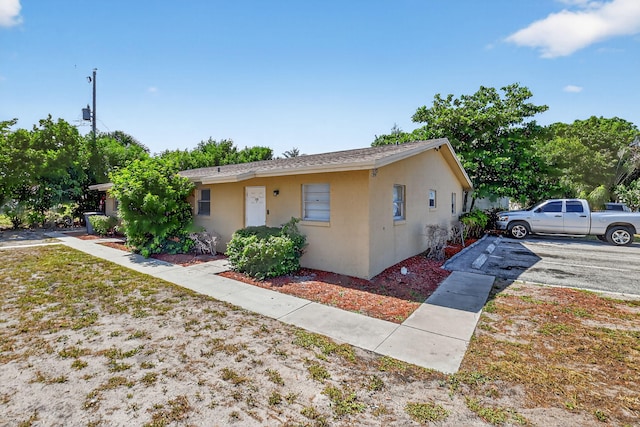 7891 Loomis St Unit 7891/7893, Lake Worth, FL 33462 - view of front of home with stucco siding