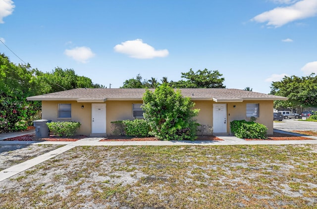 7891 Loomis St Unit 7891/7893, Lake Worth, FL 33462 - view of front of house with stucco siding