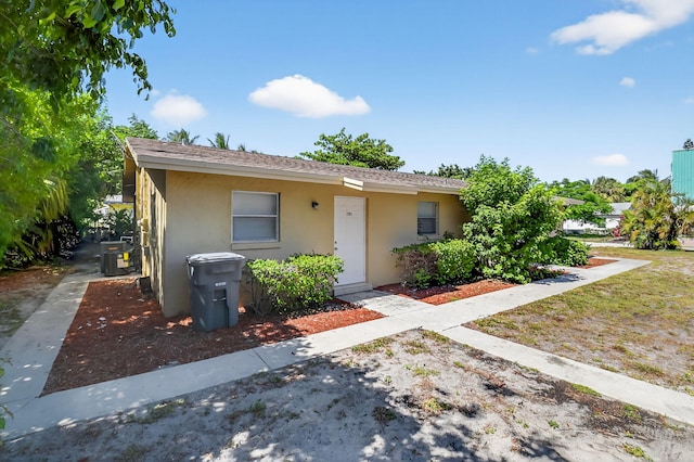 7891 Loomis St Unit 7891/7893, Lake Worth, FL 33462 - view of front of property with stucco siding