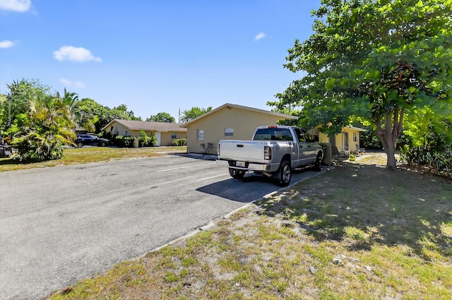 7891 Loomis St Unit 7891/7893, Lake Worth, FL 33462 - view of front of home with stucco siding