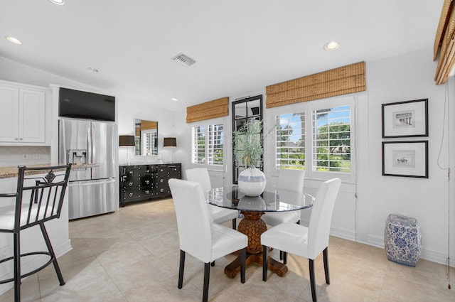 574 Emerald Way E, Deerfield Beach, FL 33442 - dining space featuring recessed lighting, light tile patterned flooring, and vaulted ceiling