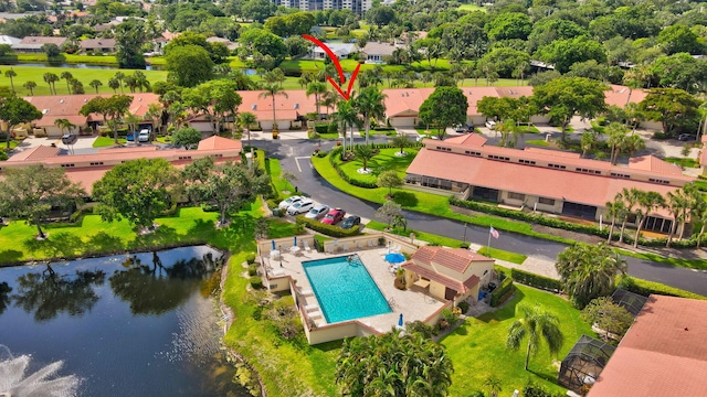 574 Emerald Way E, Deerfield Beach, FL 33442 - aerial view of residential area featuring a large body of water and a pool area