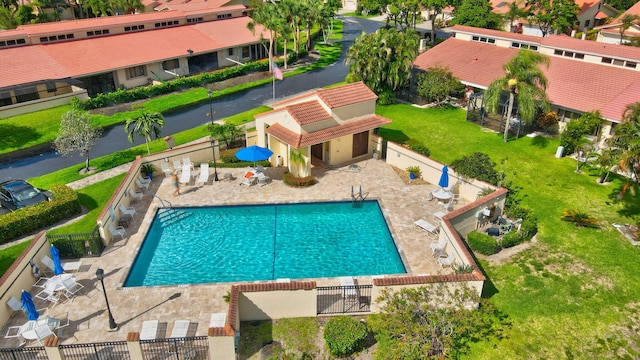 574 Emerald Way E, Deerfield Beach, FL 33442 - community pool featuring a patio area