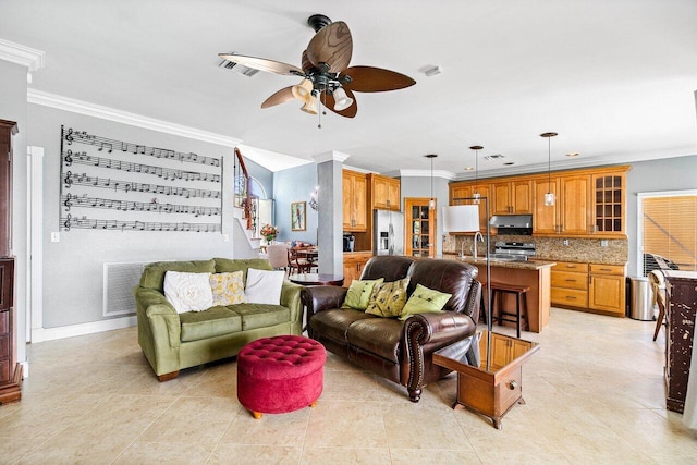 7141 Charleston Point Dr, Lake Worth, FL 33467 - living area with crown molding, a ceiling fan, and light tile patterned floors