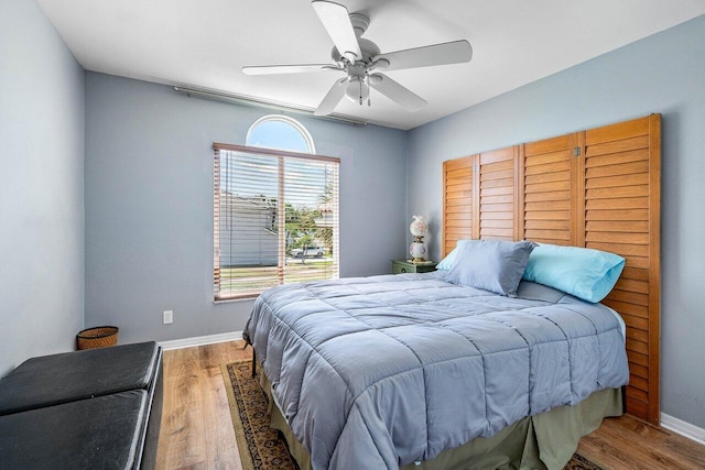7141 Charleston Point Dr, Lake Worth, FL 33467 - bedroom featuring wood finished floors and a ceiling fan