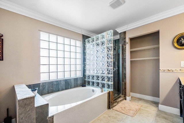 7141 Charleston Point Dr, Lake Worth, FL 33467 - bathroom with a garden tub, ornamental molding, a stall shower, vanity, and tile patterned flooring