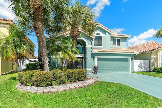 7141 Charleston Point Dr, Lake Worth, FL 33467 - mediterranean / spanish-style home featuring a tiled roof, driveway, and stucco siding
