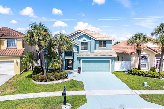 7141 Charleston Point Dr, Lake Worth, FL 33467 - mediterranean / spanish-style home featuring a tile roof, stucco siding, driveway, and an attached garage