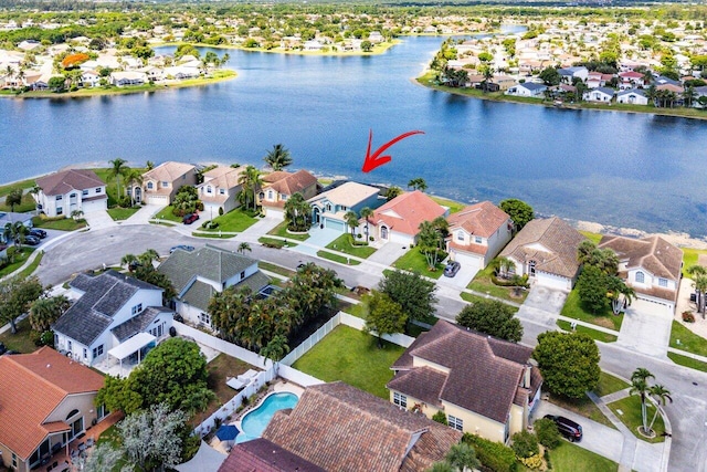 7141 Charleston Point Dr, Lake Worth, FL 33467 - aerial view of residential area featuring a nearby body of water